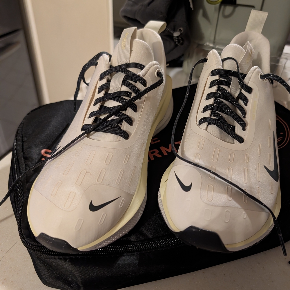 Nike Cream and Black Running Shoes